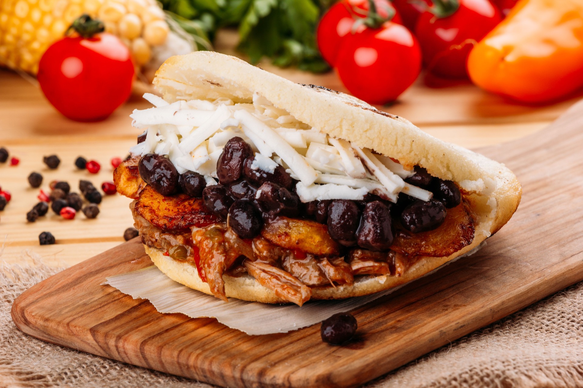 The typical Venezuelan Arepa called Pabellon, which has seasoned minced meat, fried plantain, black beans and white cheese